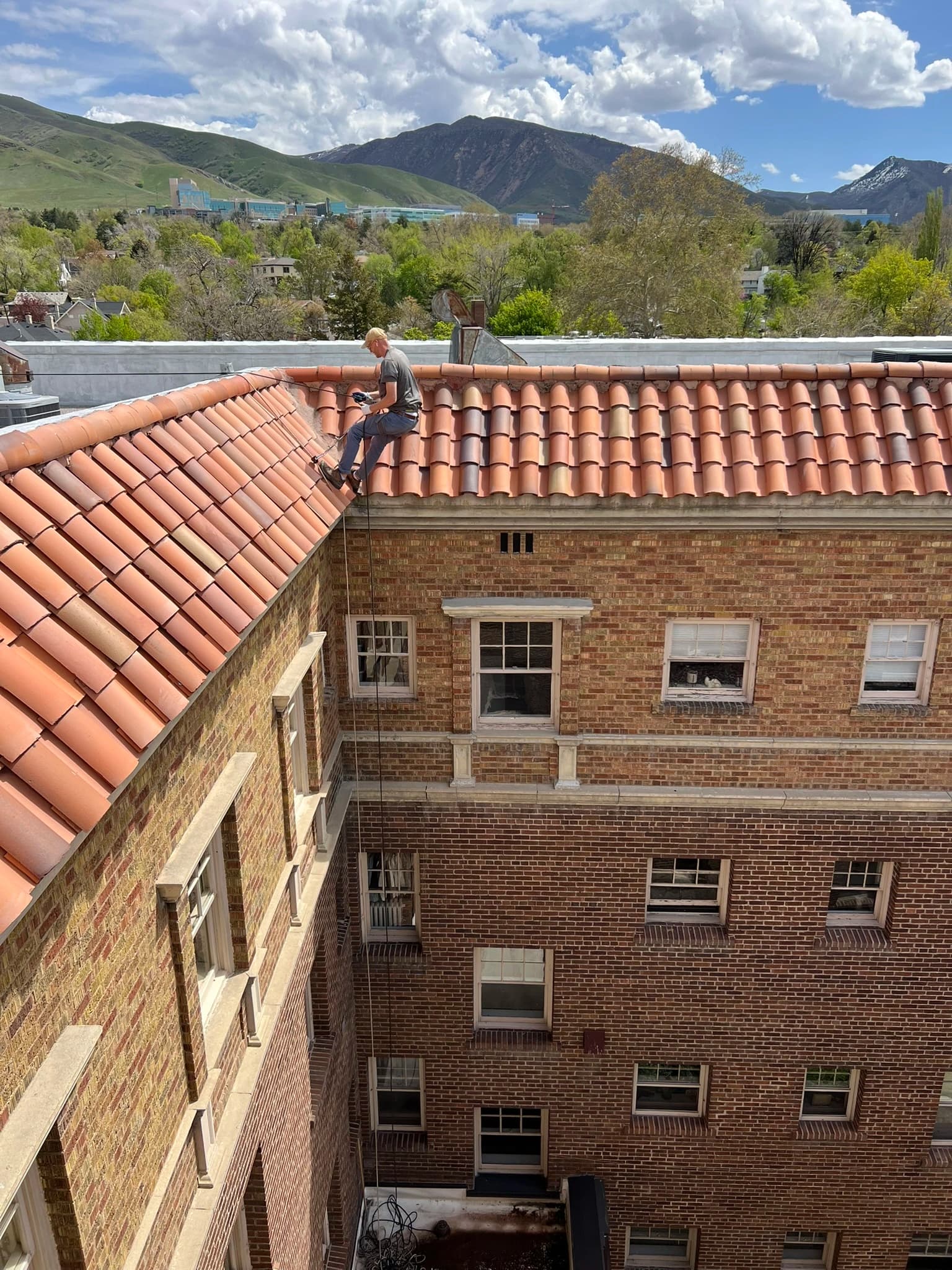 Aerial view of tile roof work